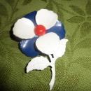 Red white and blue brooch
