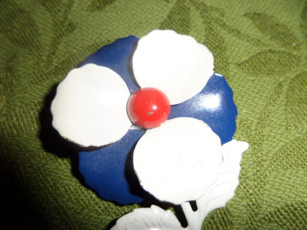 Red white and blue brooch