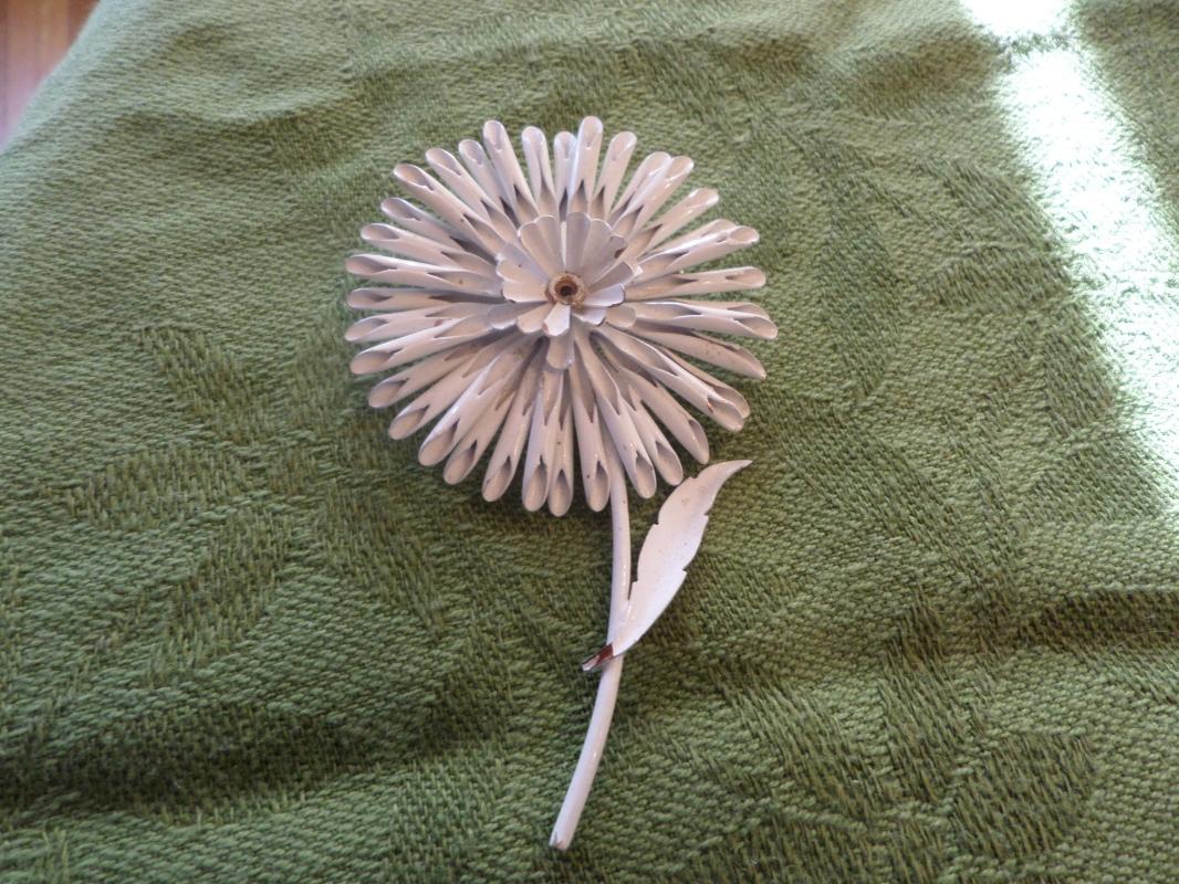 White sun flower brooch