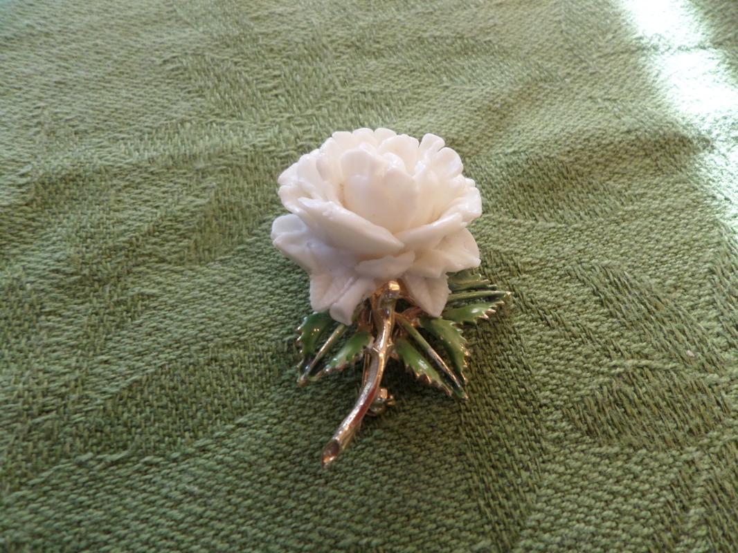 White rose brooch