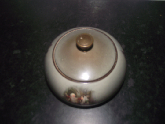 A.O.C. Globe brand shakespeare pattern tobacco jar / humidor with patent hermetic lid