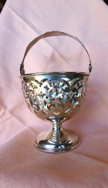 Sterling silver Ornate urn shaped pierced serving piece with handle