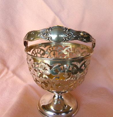 Sterling silver Ornate urn shaped pierced serving piece with handle