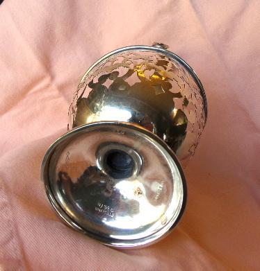 Sterling silver Ornate urn shaped pierced serving piece with handle