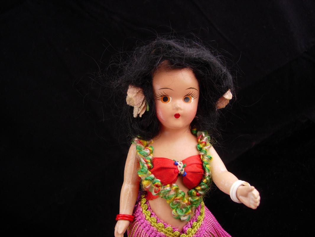 Vintage Hawaiian doll / hula girl / Polynesian costume / jointed bisque and composition / Hawaii lei / hula skirt / retro gift / with stand