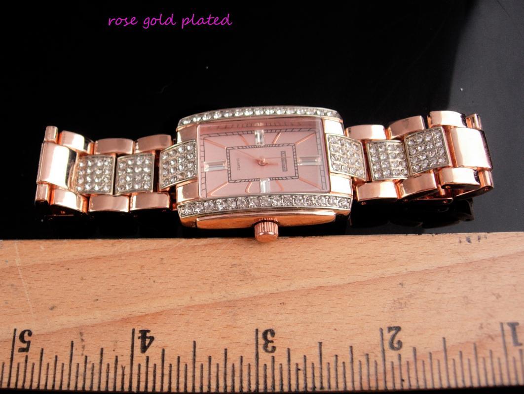 Rhinestone watch / rose gold plate band / mens womens bracelet watch / works great / baguette face / 8