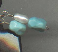 Pendent/Native American Style Carved Thunderbird ?Onyx W/ 2 Turqoise beads & a Freshwater Pearl