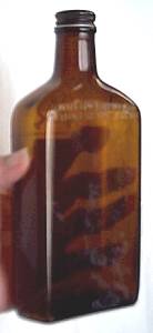 Bottle(s)/One Pint Size Amber Bottle W/Insiced Horn&Crop Detail