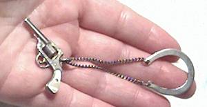Misc. Sterling Six Shooter & Horse Shoe