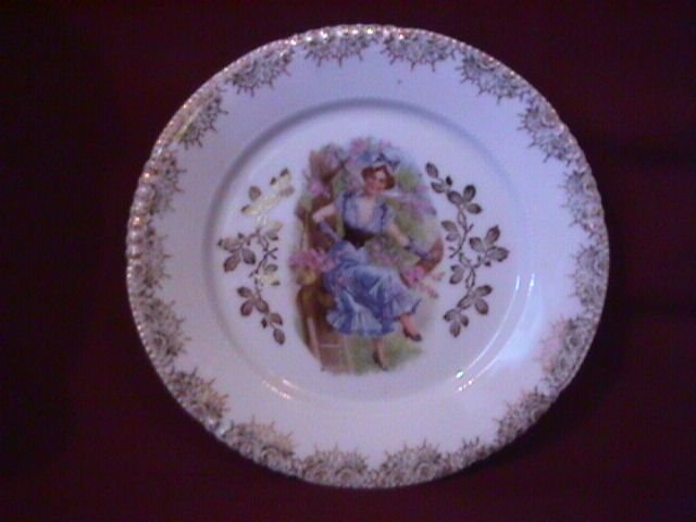 Porcelain Display Plate Featuring Lady In Tree With Basket of Pink Flowers