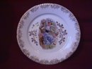 Porcelain Display Plate Featuring Lady In Tree With Basket of Pink Flowers