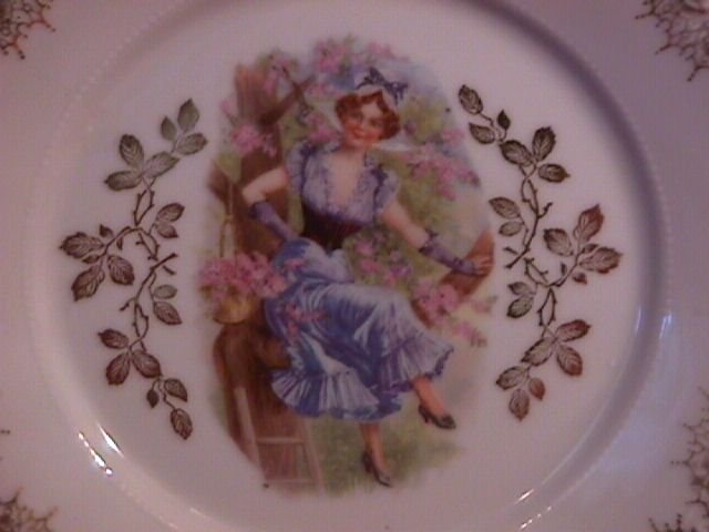 Porcelain Display Plate Featuring Lady In Tree With Basket of Pink Flowers