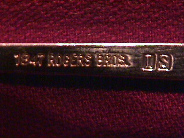 International Rogers 1847 (Magic Rose) Casserole Spoon
