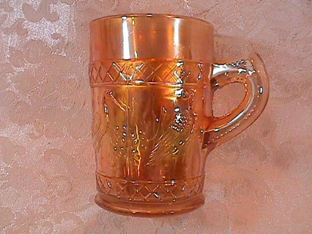 CARNIVAL GLASS STORK and RUSHES MUG MARIGOLD