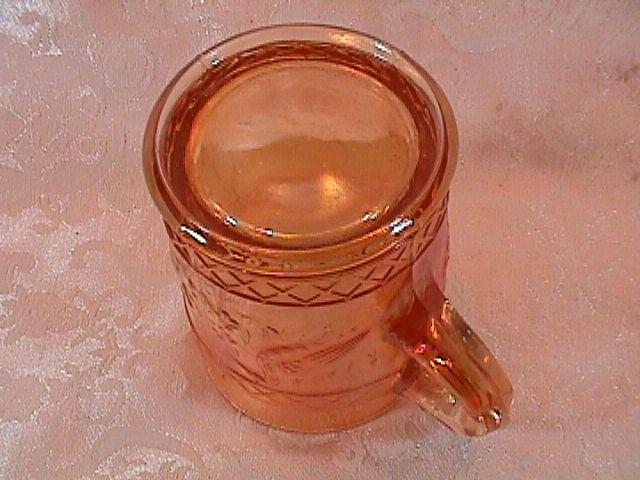 CARNIVAL GLASS STORK and RUSHES MUG MARIGOLD