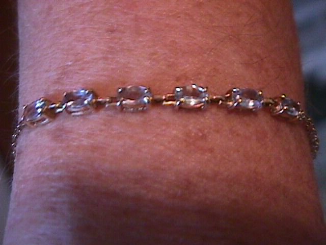 10k Gold Bracelet with Light Blue Topaz