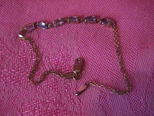 10k Gold Bracelet with Light Blue Topaz