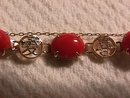 14K Solid Gold and Genuine Coral Asian Motif Bracelet