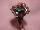 10K Gold and Diamond Ring with a Marquise Emerald