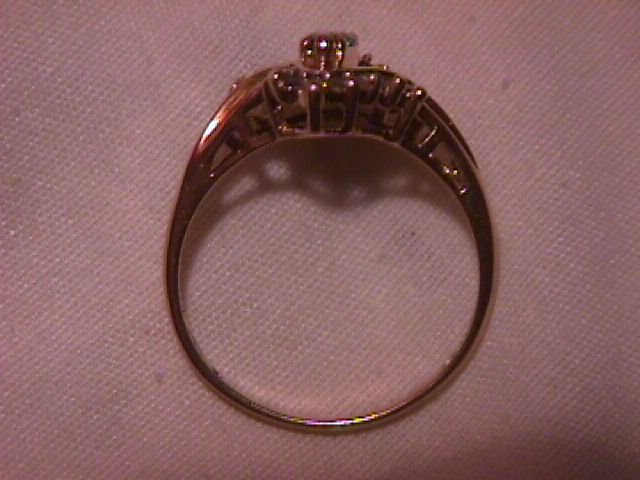 10K Gold and Diamond Ring with a Marquise Emerald