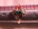 10K Gold and Diamond Ring with a Marquise Emerald