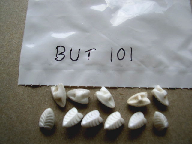 Buttons - Milkglass Arrowhead