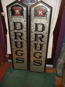 A Pair of Vintage Reverse Painted Drug Store Signs