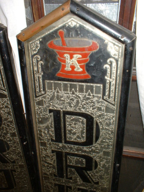A Pair of Vintage Reverse Painted Drug Store Signs