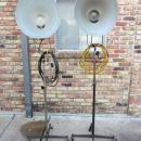 VERY RARE! PAIR OF VINTAGE PHOTOGENIC MACHINE CO. INDUSTRIAL MACHINE AGE STEAM PUNK MID-CENTURY MODERN ADJUSTABLE FLOOR LAMPS FLOODLIGHTS MODEL LIGHT ON IRON WHEEL BASE CASTERS