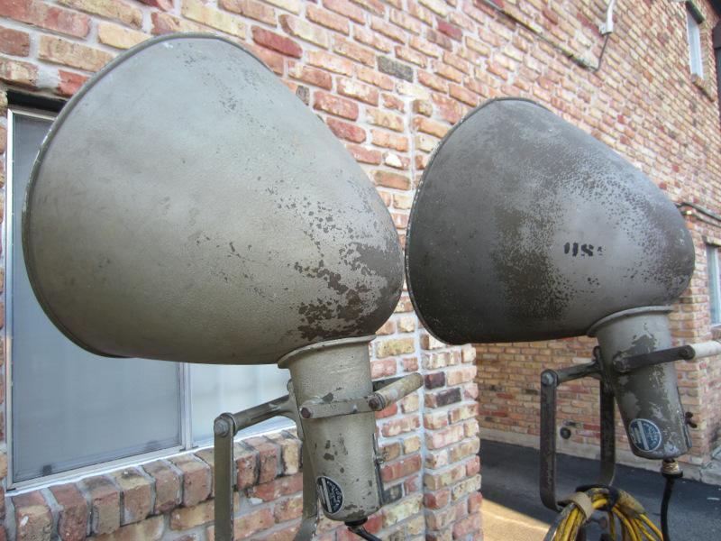 VERY RARE! PAIR OF VINTAGE PHOTOGENIC MACHINE CO. INDUSTRIAL MACHINE AGE STEAM PUNK MID-CENTURY MODERN ADJUSTABLE FLOOR LAMPS FLOODLIGHTS MODEL LIGHT ON IRON WHEEL BASE CASTERS