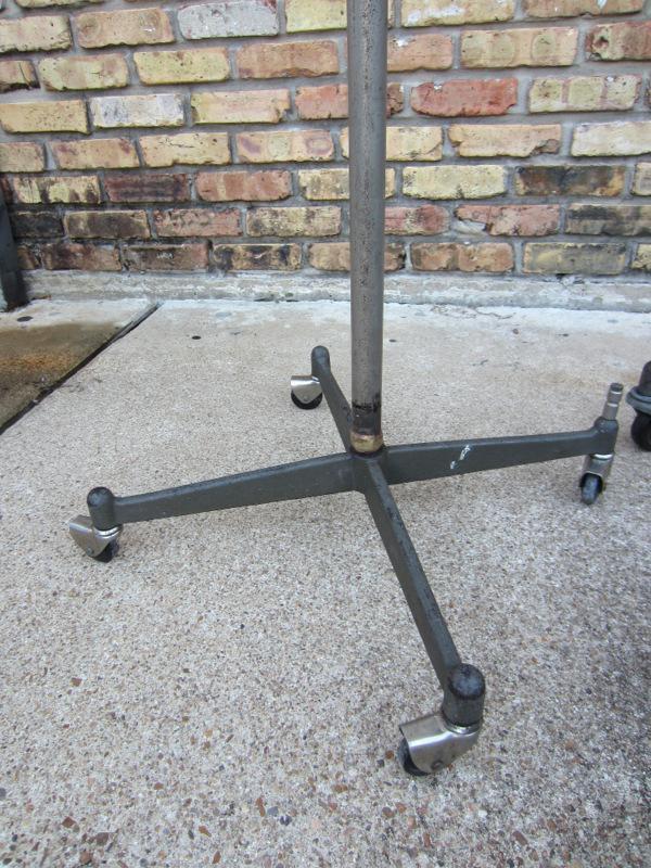 VERY RARE! PAIR OF VINTAGE PHOTOGENIC MACHINE CO. INDUSTRIAL MACHINE AGE STEAM PUNK MID-CENTURY MODERN ADJUSTABLE FLOOR LAMPS FLOODLIGHTS MODEL LIGHT ON IRON WHEEL BASE CASTERS