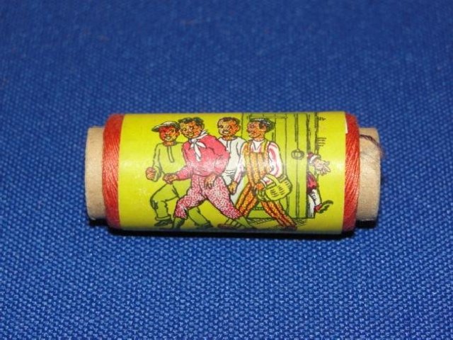 Black Americana Spool of Thread.