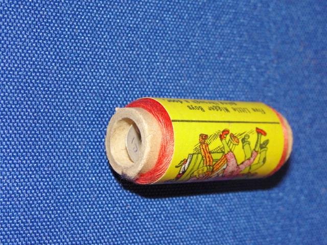 Black Americana Spool of Thread.
