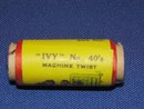Black Americana Spool of Thread.