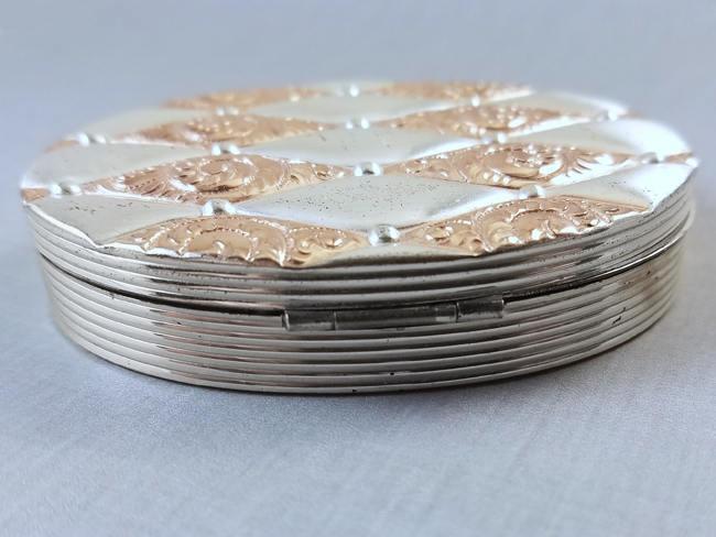 Vintage Art Deco 1940 patent date sterling silver and rose gold quilted pattern mirrored compact signed Evans