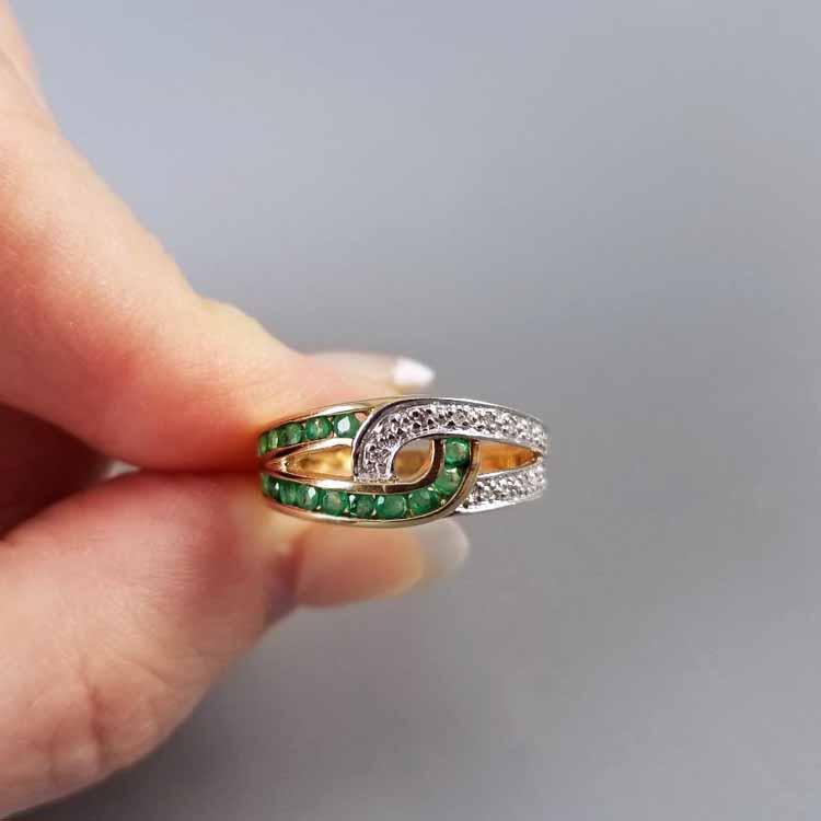 Modern estate 10k two tone yellow and white gold channel set emerald and diamond intertwined band ring, size 7