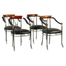 7401 Set of four chrome and bronze chairs, each having swan decorated arms and upholstered seats circa 1920.