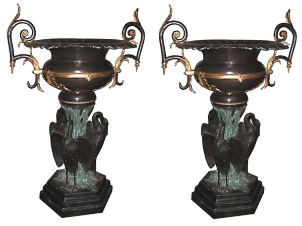 70.2606 Pair of Large Bronze Urns with Three Herons at Base