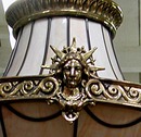 56.645 Cast Bronze & Leaded Glass Canopied Chandelier