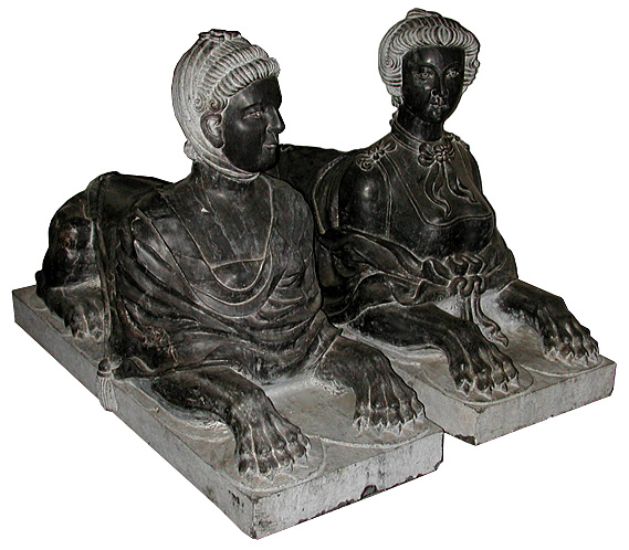 68.5867 Pair of Black Marble Sphinxes.