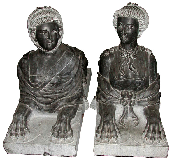 68.5867 Pair of Black Marble Sphinxes.