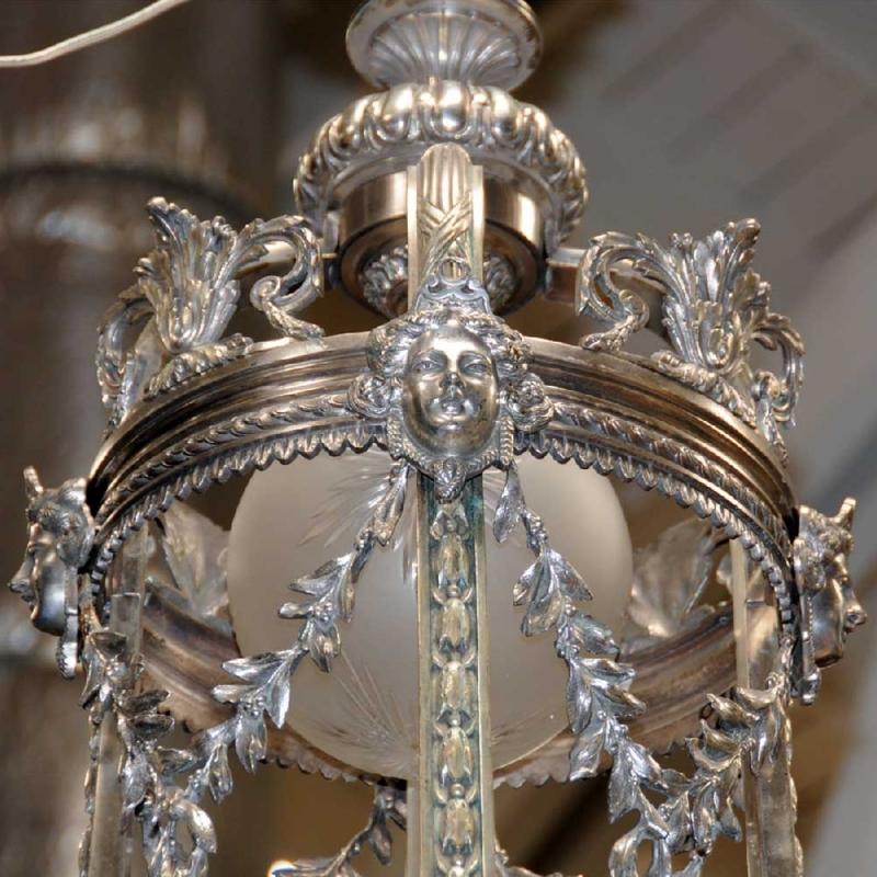 6991 Silver Over Bronze Chandelier with Female Masks