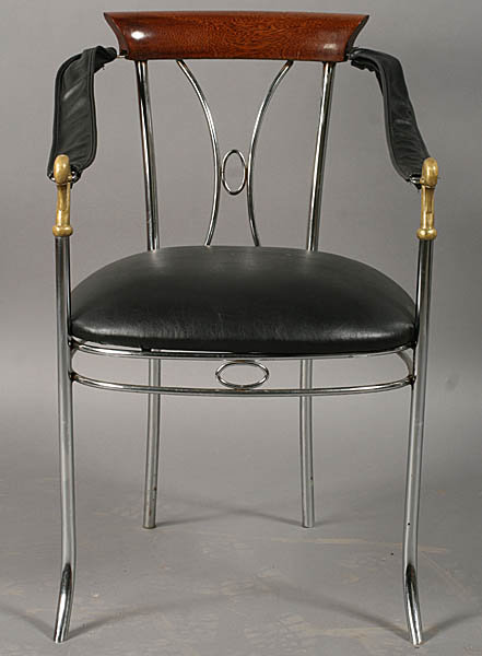 7401 A stylish set of four chrome and bronze chairs, each having swan decorated arms and upholstered seats circa 1920.