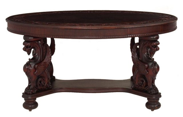 Carved top mahogany griffen oval table