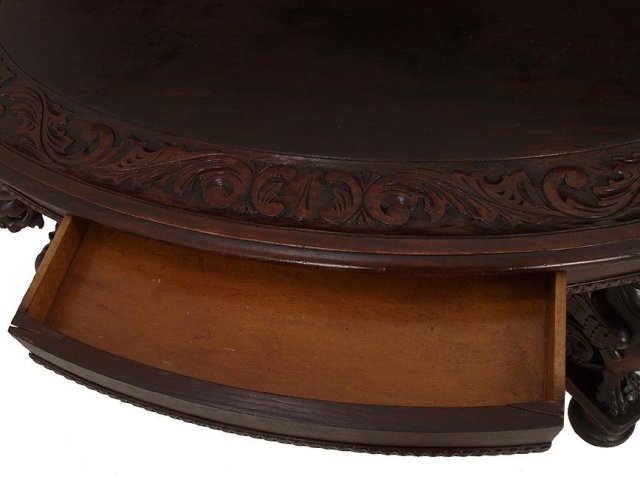 Carved top mahogany griffen oval table