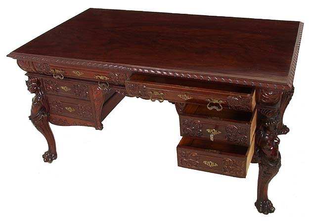 Figural carved Victorian mahogany partners desk