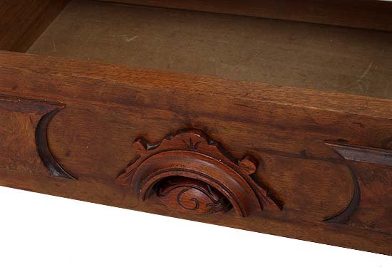 Walnut Victorian etagere with carved head