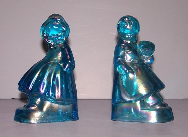 Iridescent Blue Bookends of a boy and Girl