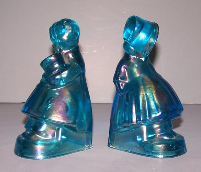 Iridescent Blue Bookends of a boy and Girl