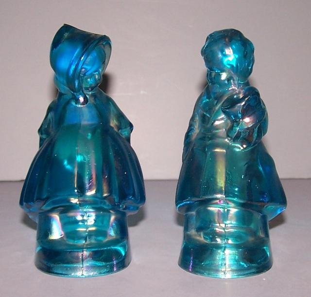 Iridescent Blue Bookends of a boy and Girl